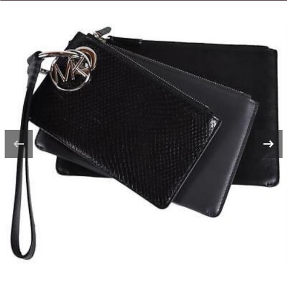 Michael Kors Handbags - EUC MK Michael Kors Leather Multi Pouch Trio in Charcoal. 3 wristlets in one.